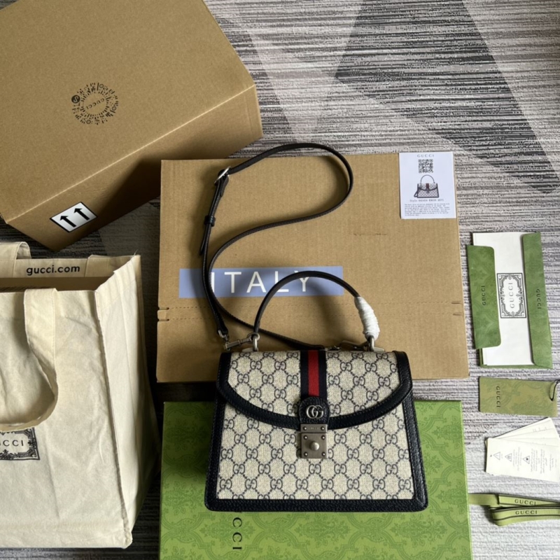 G*u*i top handle bags